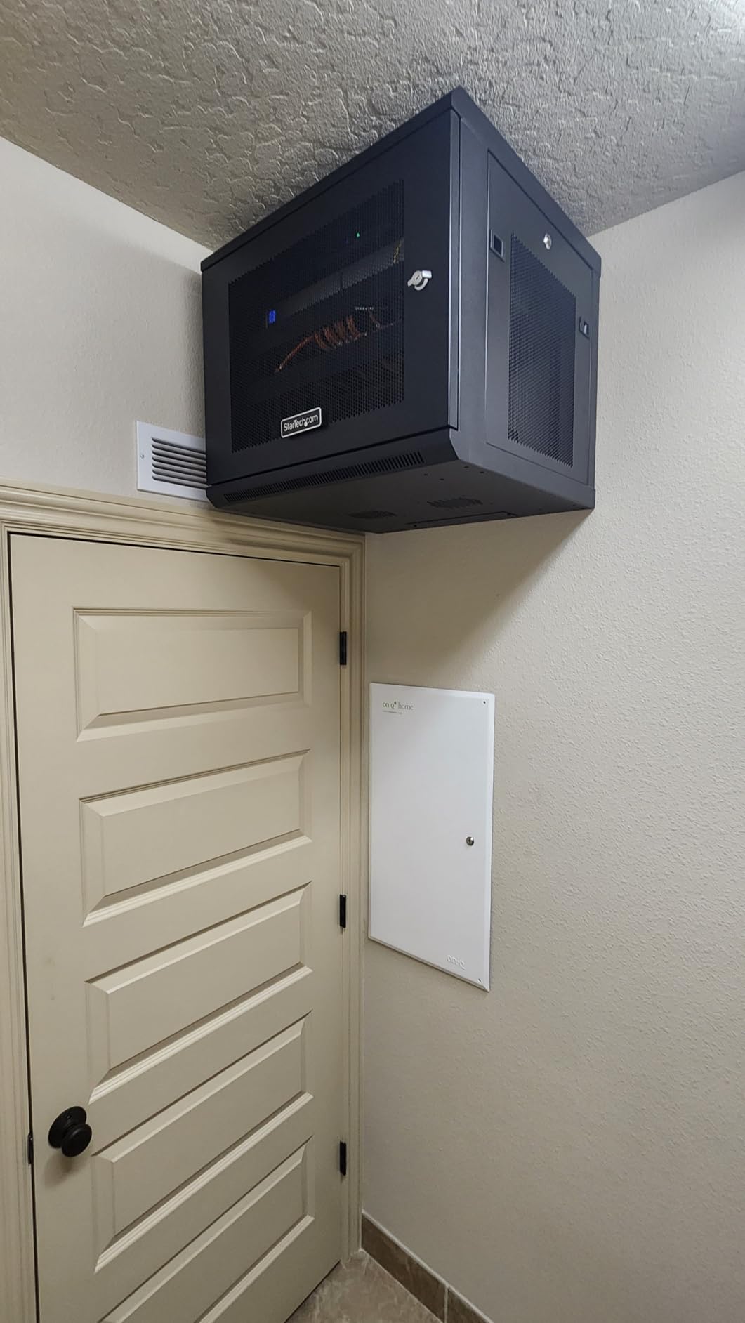 StarTech.com 2-Post 6U Wall Mount Network Cabinet with 1U Shelf - Ships Fully Assembled customer photo 1