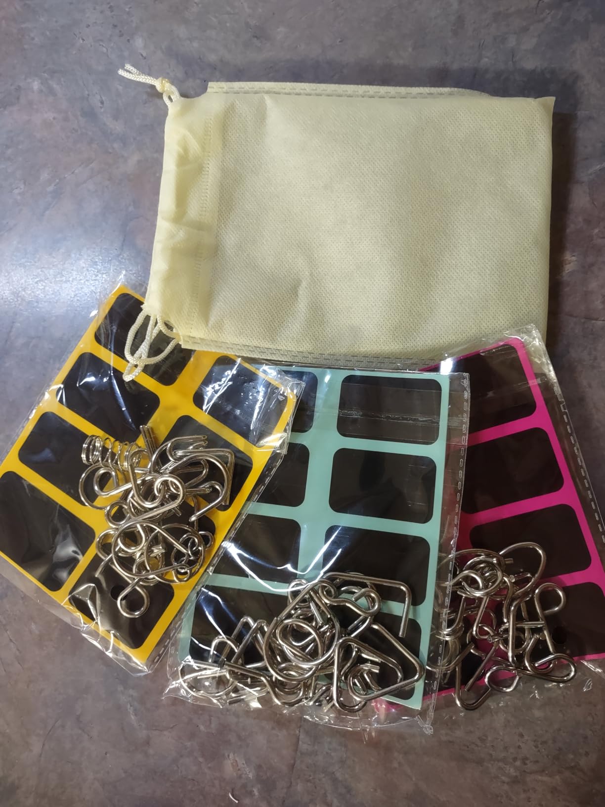 Metal Wire Puzzle Set of 24 with Pouch,Brain Teaser IQ Test Disentanglemen Iron Link Unlock Interlock Game Chinese Ring Magic Trick Toy for Party Favor Kids Adults Challenge customer photo 2