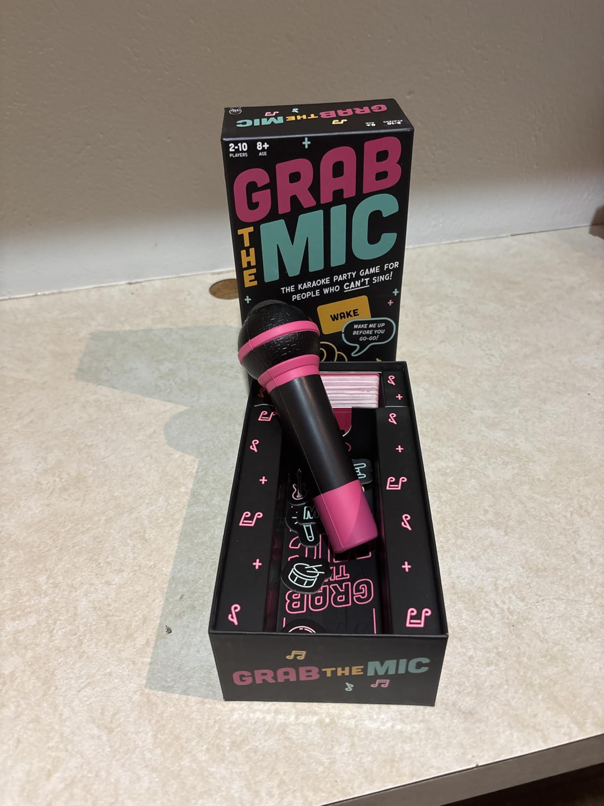 Lucky Egg Official Grab The Mic - Family Karaoke Board Game w/Foam Mic, 8+ Ages, 2-10 Players - Games for Bad Singers w/ 240 Lyrics (120 Cards) (First Edition) customer photo 1