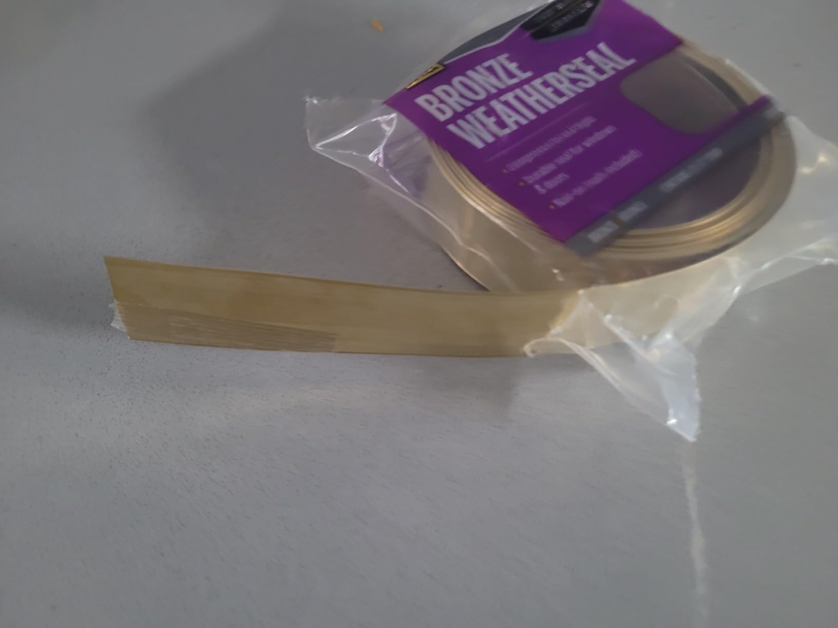 M-D Building Products 52000 1-1/8 in. x 17 ft. Bronze Aluminum Nail-on Weatherseal for Doors and Windows customer photo 2