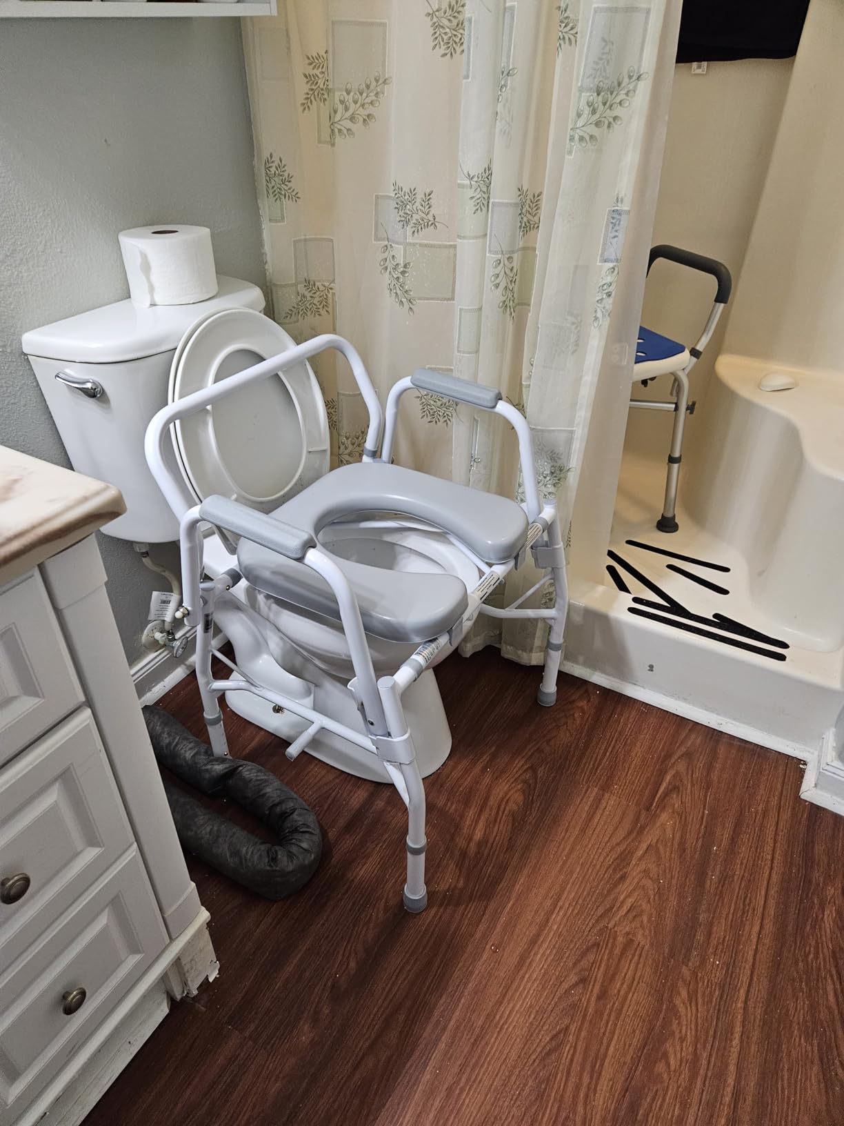 Medline Drop Arm Commode Chair for Adults and Seniors, Padded Seat, Removable Pail, Splash Guard, Drop-Down Arms, 350 lb. Weight Capacity customer photo 1