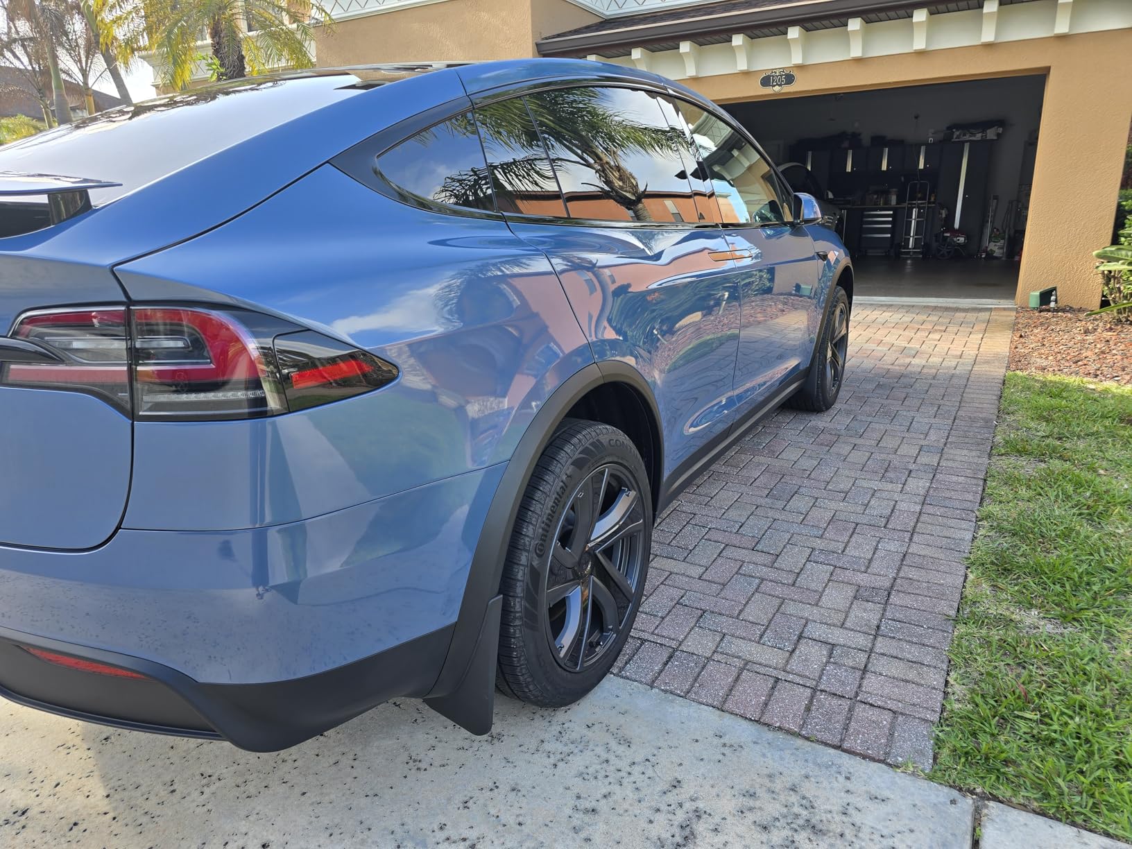 BASENOR 2024-2020 Tesla Model Y Mud Flaps Splash Guards Vehicle Sediment Protection No Drilling No Tape Mudflaps Tire Protector Mudflaps All Weather Tesla Exterior Accessories (Set of 4) customer photo 1