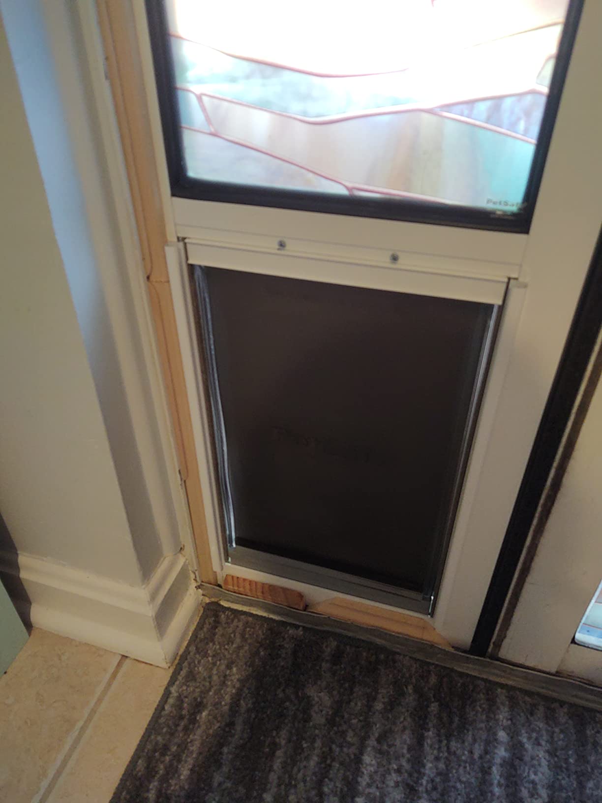 PetSafe Extreme Weather Sliding Glass Pet Door - Energy Efficient Entry for Dogs & Cats - Triple Flap with Magnetic Seal - Durable Aluminum Frame - Easy Install - Large customer photo 2