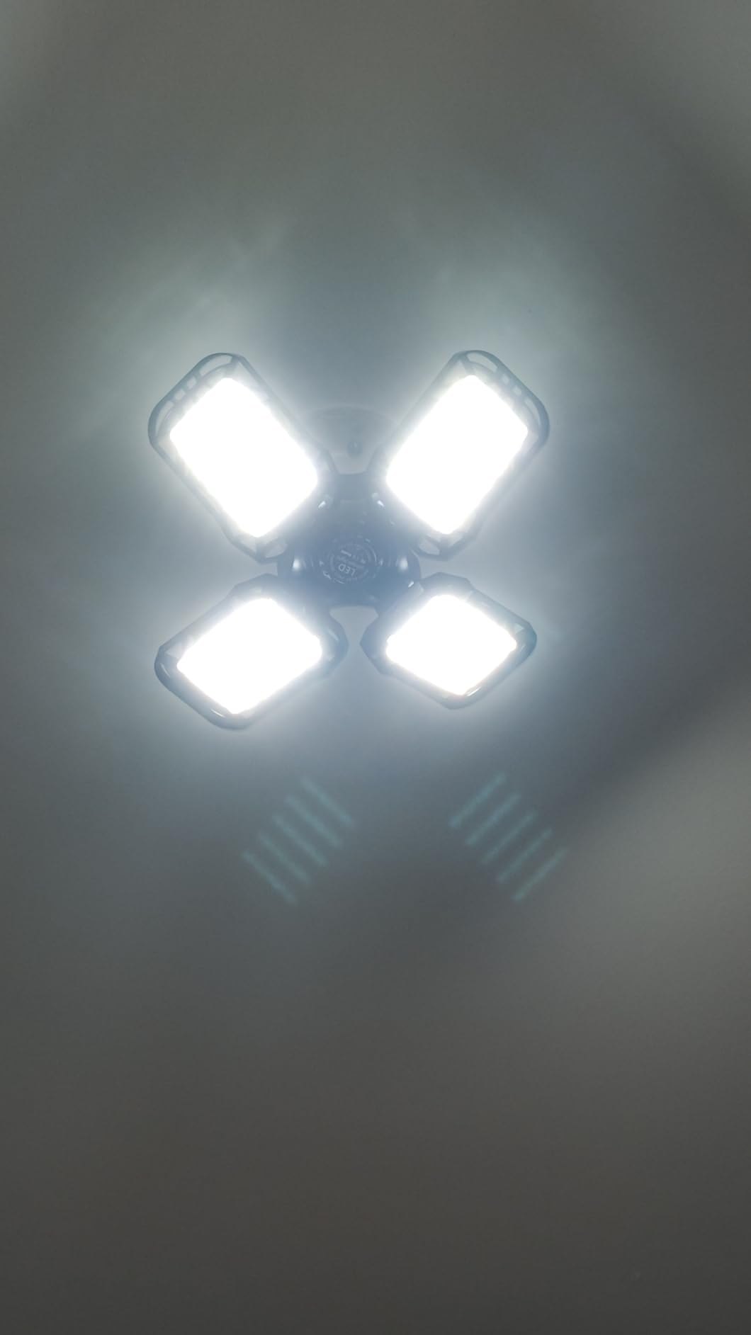 LED Garage Light 4 Pack, 180W Ultra Bright LED Shop Light with 4 Adjustable Panels, 18000LM E26/E27 Base Deformable Ceiling Fixtures for Garage, Workshop, Attic, Basement, Barn (Black-4 Pack) customer photo 1