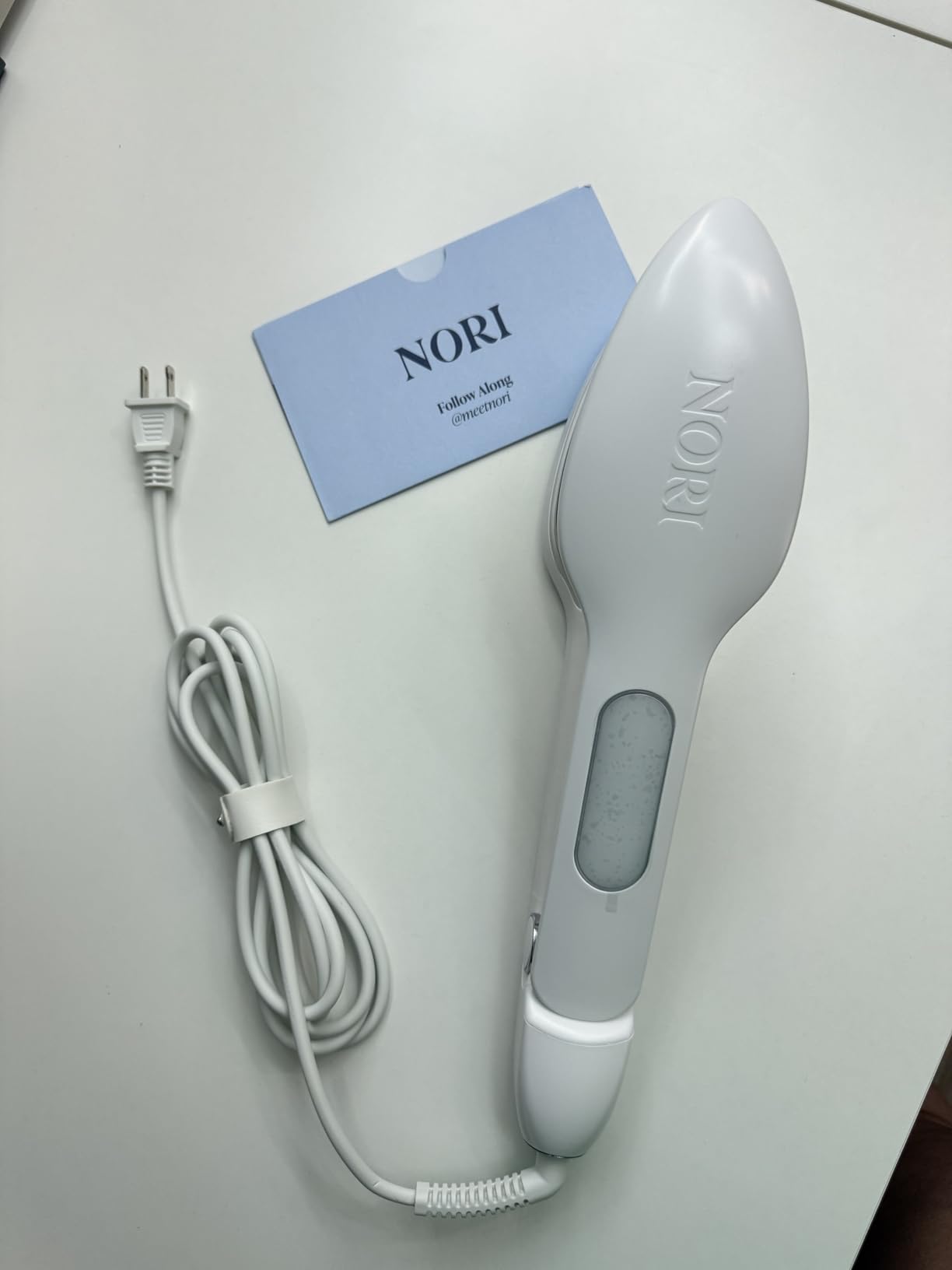 Nori Press Travel Steam Iron - Handheld Iron With Optional Steam Feature - No Ironing Board Required - Easy to Use w/ 6 Fabric Settings - Removes Wrinkles - User Manual Included - White customer photo 1