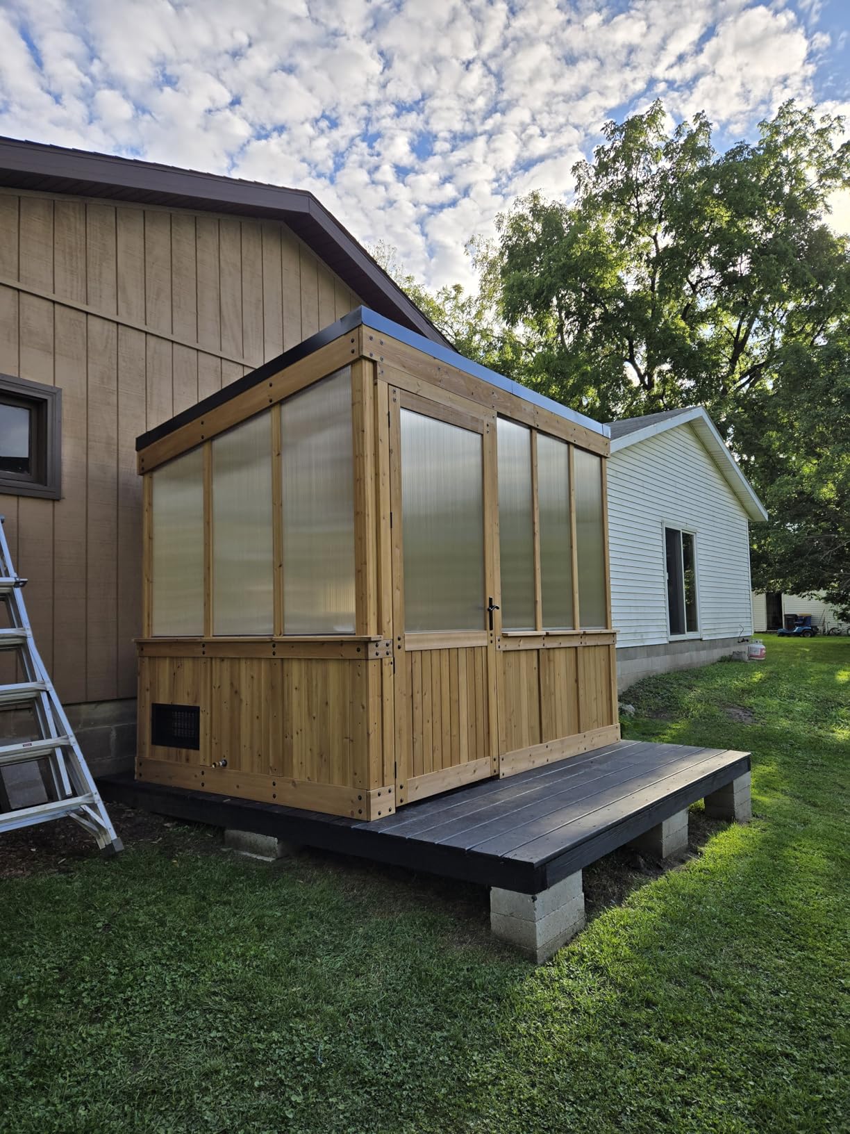 Backyard Discovery Zalie 11' x 7' Cedar Wood and Polycarbonate Walk-in Greenhouse Kit with Exhaust Fan, Windows, Hose Hook-Ups, PowerPort, Staging Shelves for Year-Round Outdoor Gardening customer photo 2
