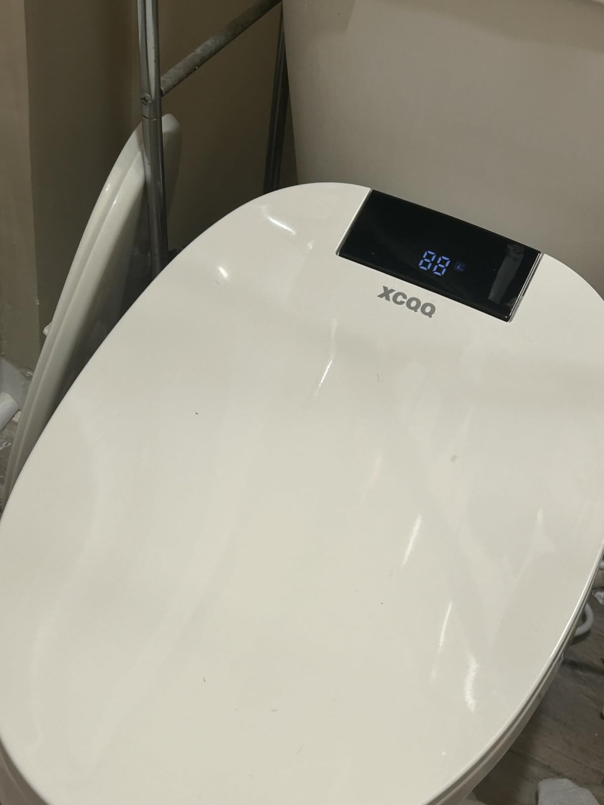 XCQQ Electric Bidet Toilet Seat with Remote, Heated Toilet Seat, Instant Warm Water, Warm Air Dryer, Rear & Feminine with Oscillating Cleansing, Night Light, Slow Close Lid, LED Display - Elongated customer photo 1