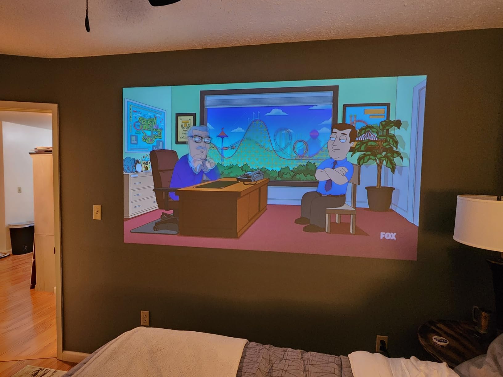 XGIMI Elfin Flip Plus Portable Projector, Google TV with Licensed Netflix, 500 ISO Lumens, 1080P Resolution Home Projector, Build-in Adjustable Stand, Lightweight and Compact Design, Screen Adaption customer photo 2