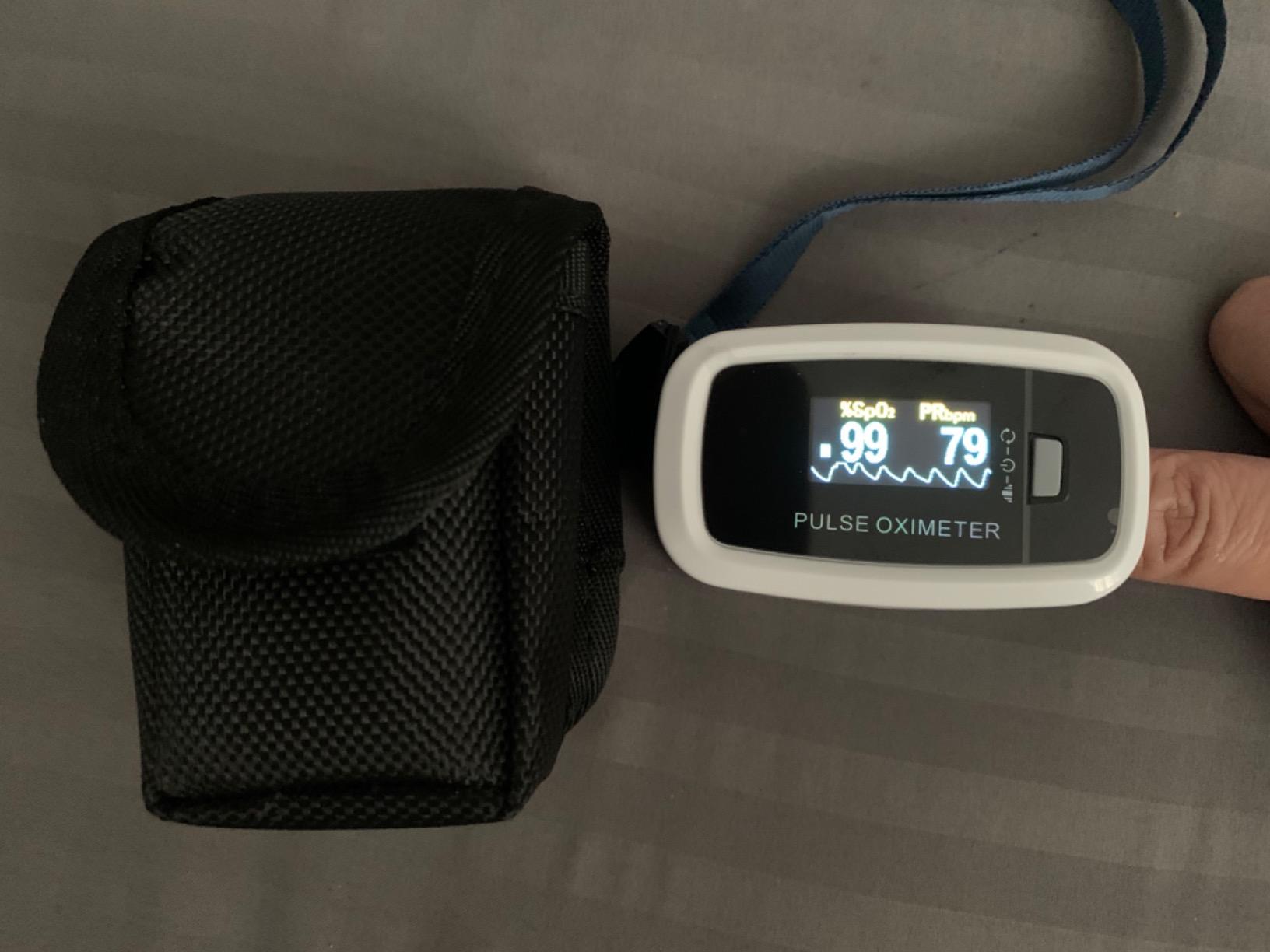 AccuMed CMS-50D1 Fingertip Pulse Oximeter Blood Oxygen Sensor SpO2 for Sports and Aviation, Portable and Lightweight with LED Display, 2 AAA Batteries, Lanyard and Travel Case (White) customer photo 1