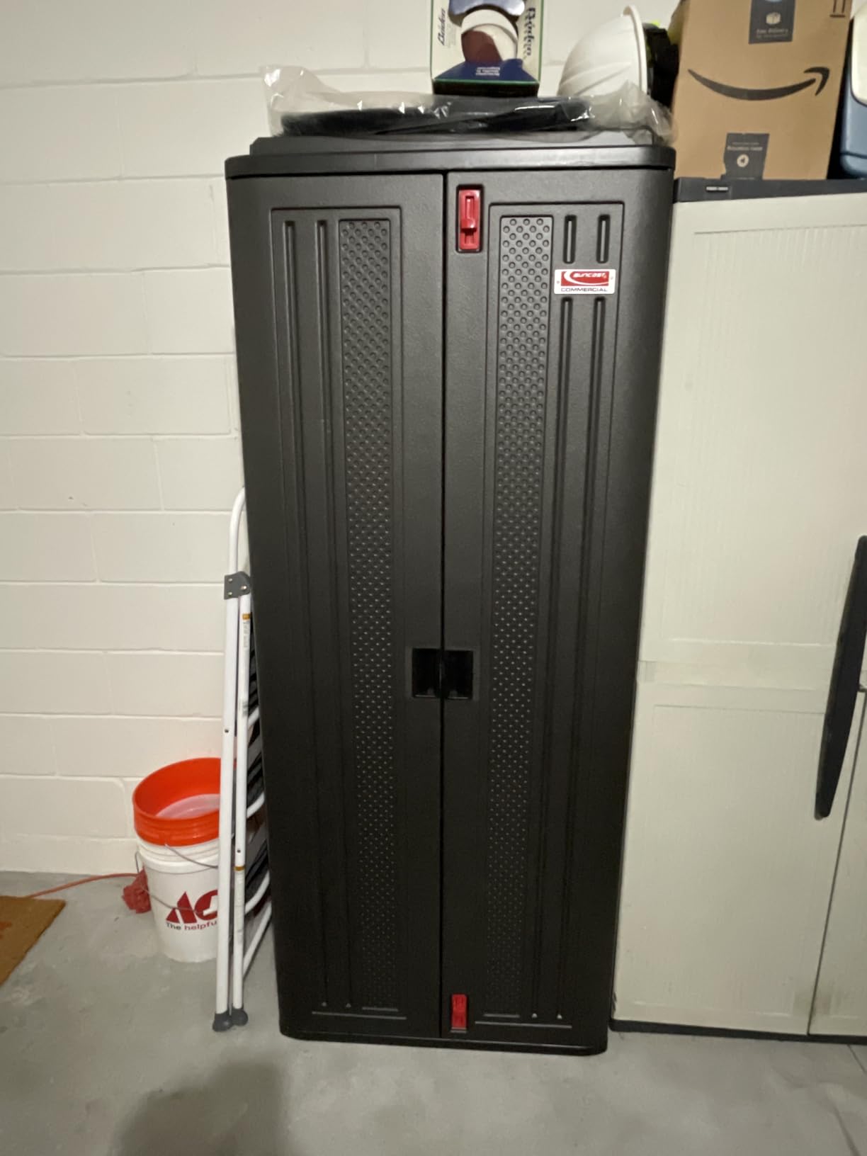 Suncast 19 Cubic Ft. Heavy-Duty Resin Cabinet with Lockable Handles, Multi-Wall Construction, and Metal-Reinforced Shelves for Basement, Utility Room and Garage Storage, Black, Made in the USA customer photo 1