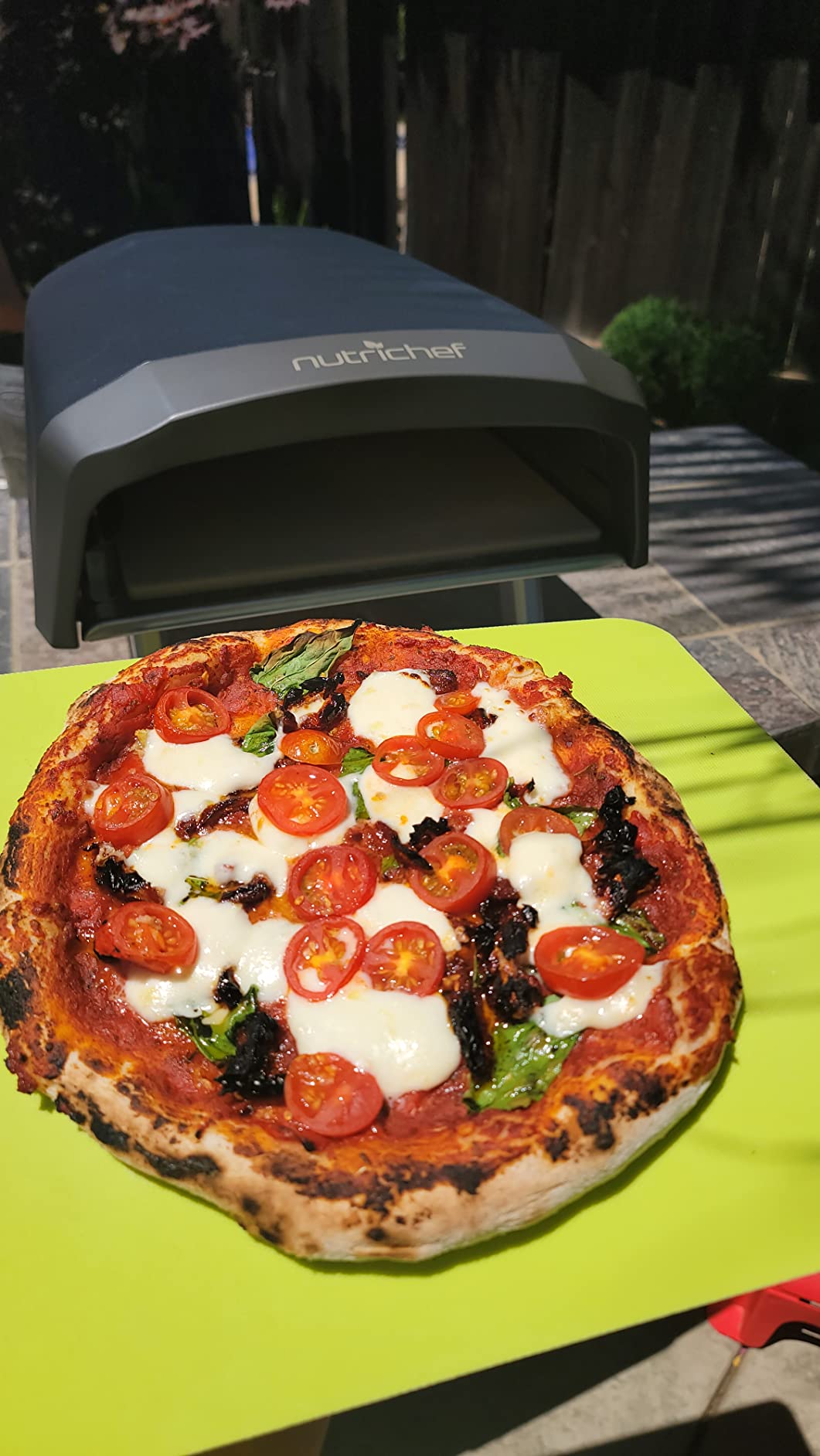 NutriChef Portable Outdoor Gas Pizza Oven - Includes Foldable Feet, Adjustable Heat Control Dial, Burner, Stone & Regulator Hose - Cooks 12