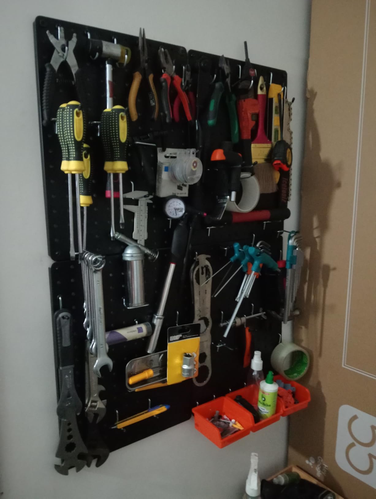 Peg Board, 110pcs Metal Pegboard Kit, Includes 4 Pack Black Peg Board Panels with Accessories and Hook Locks, Large Heavy Duty Peg Boards for Walls Home, Garage Tool Storage, Workbench customer photo 1