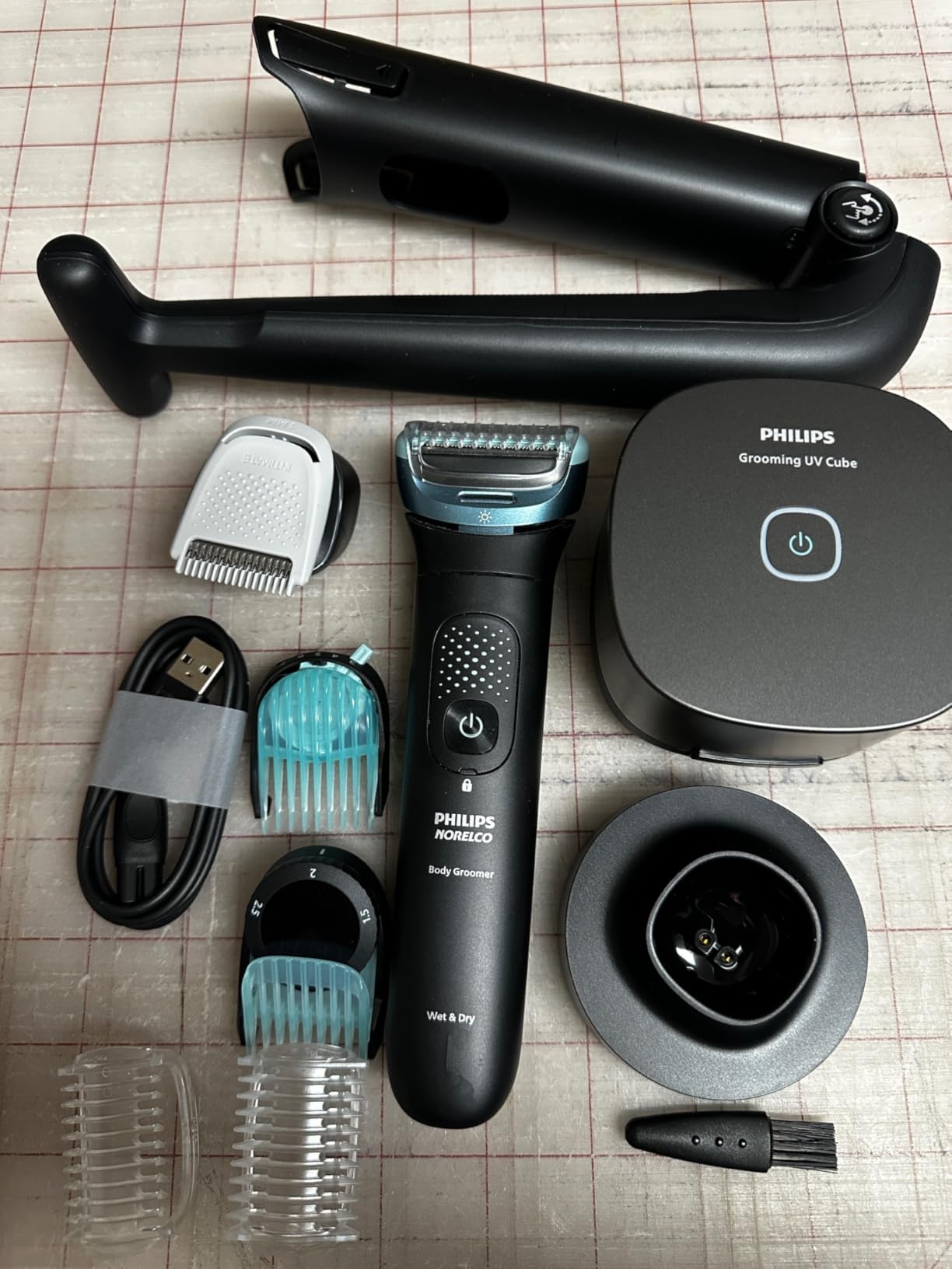 Philips Norelco Body Groomer 9000 Series, Body Hair Trimmer for Men & Intimate Shaver System with UV Cube Cleaner & Adjustable Back Attachment, 100% Showerproof, BG9480/50 customer photo 2