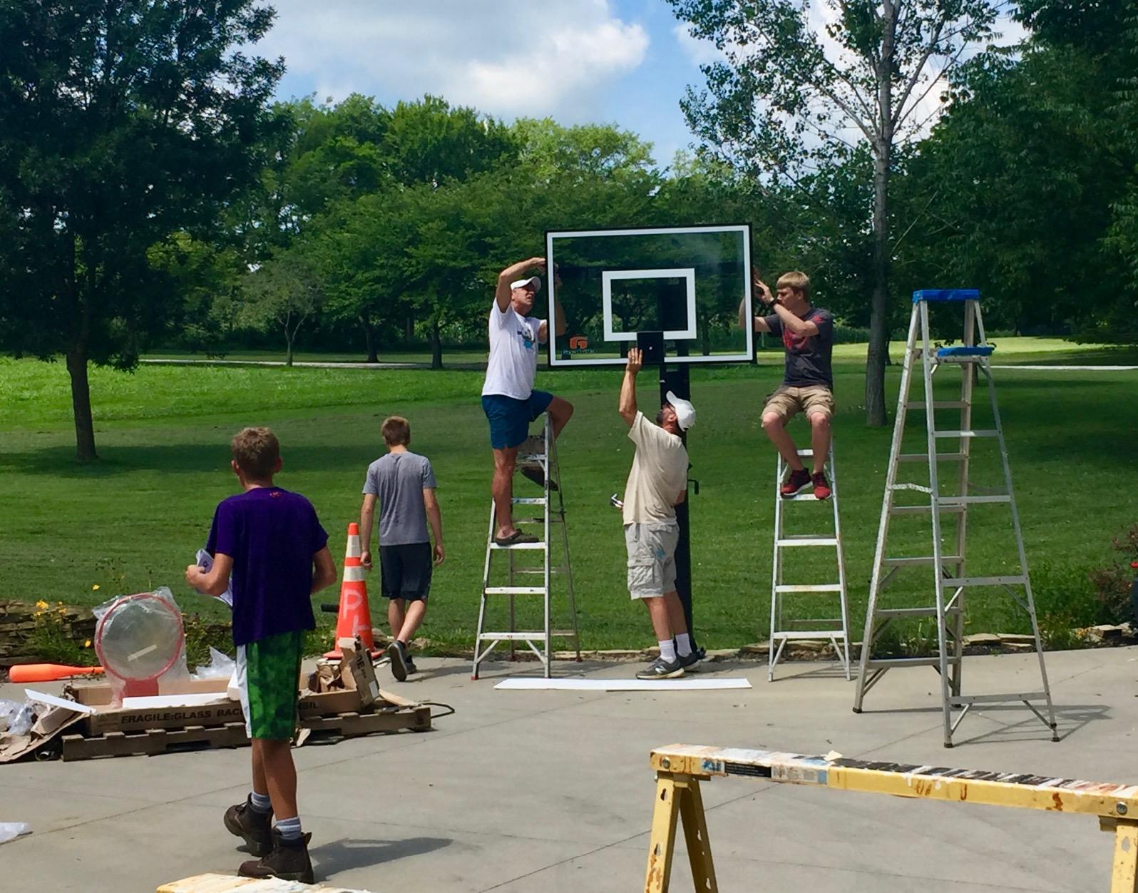Goalrilla Basketball Hoop with Tempered Glass Basketball Goal Backboard, Black Anodized Frame, and In-ground Anchor System customer photo 2