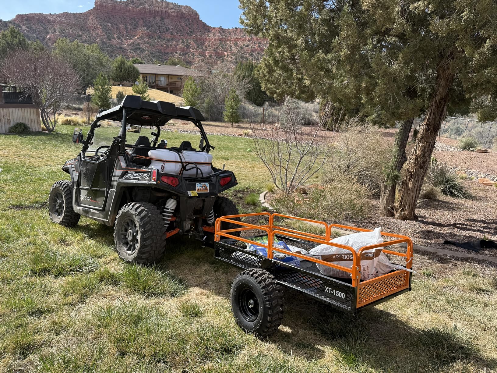 Impact IMPLEMENTS® 1500lb ATV/UTV/Tractor Trailer with Solid Steel Floor, Aggressive Tires, & Pivoting Tongue. Great for Agricultural Use & Land Management. Designed in Trademarked in The USA! customer photo 1