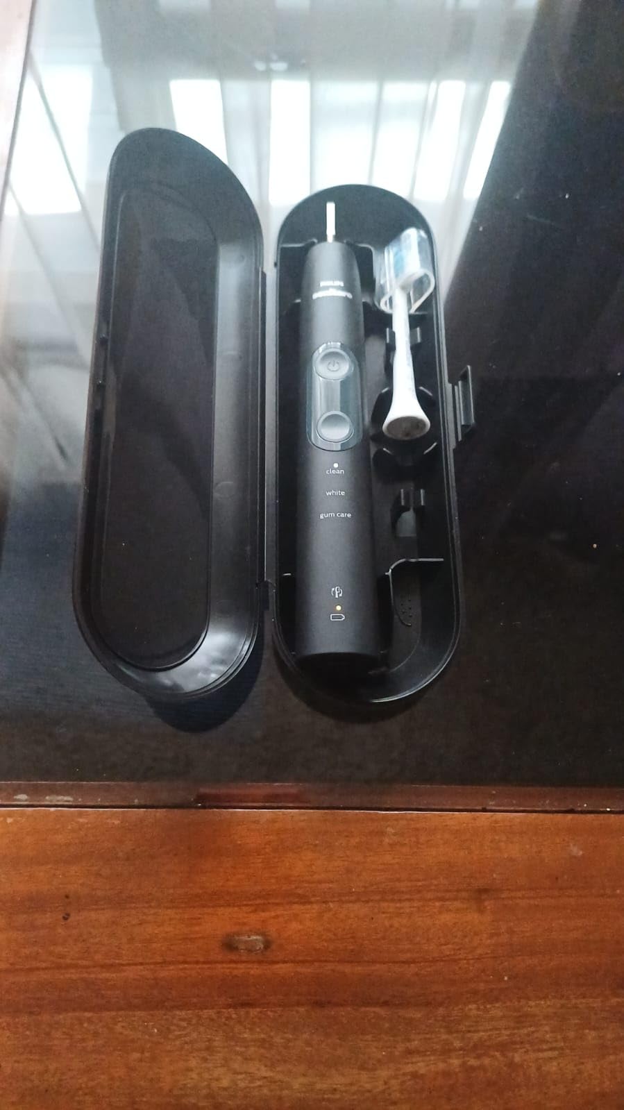 ProtectiveClean 5300 Rechargeable Electric Toothbrush, with Pressure Sensor, 3 Cleaning Modes, SmarTimer and QuadPacer, with 2 Bonus Brush Heads, Travel Case, Black, Model HX6423/34 customer photo 1
