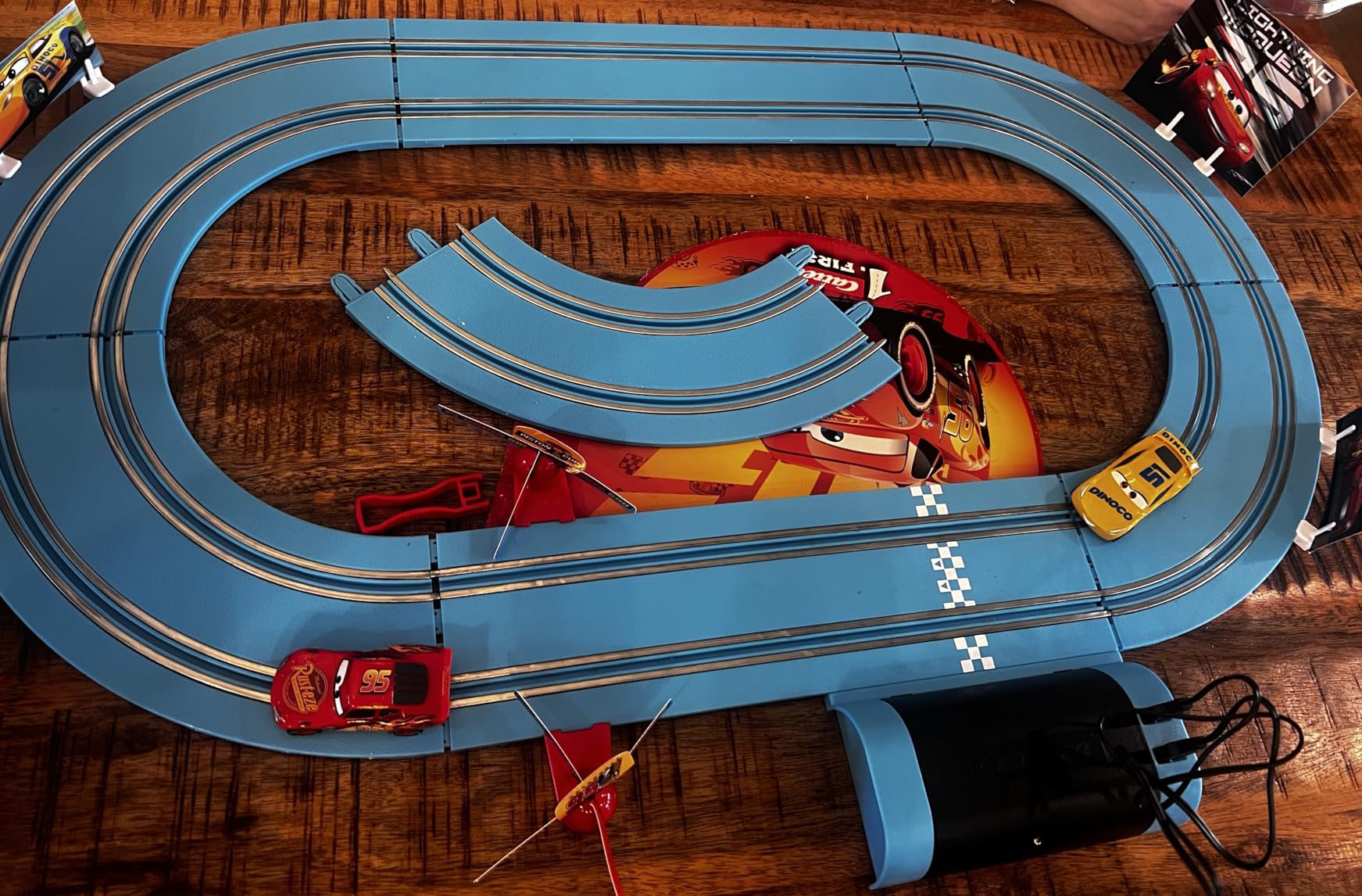 Carrera First Disney/Pixar Cars - Slot Car Race Track - Includes 2 Cars: Lightning McQueen and Dinoco Cruz - Battery-Powered Beginner Racing Set for Kids Ages 3 Years and Up customer photo 1