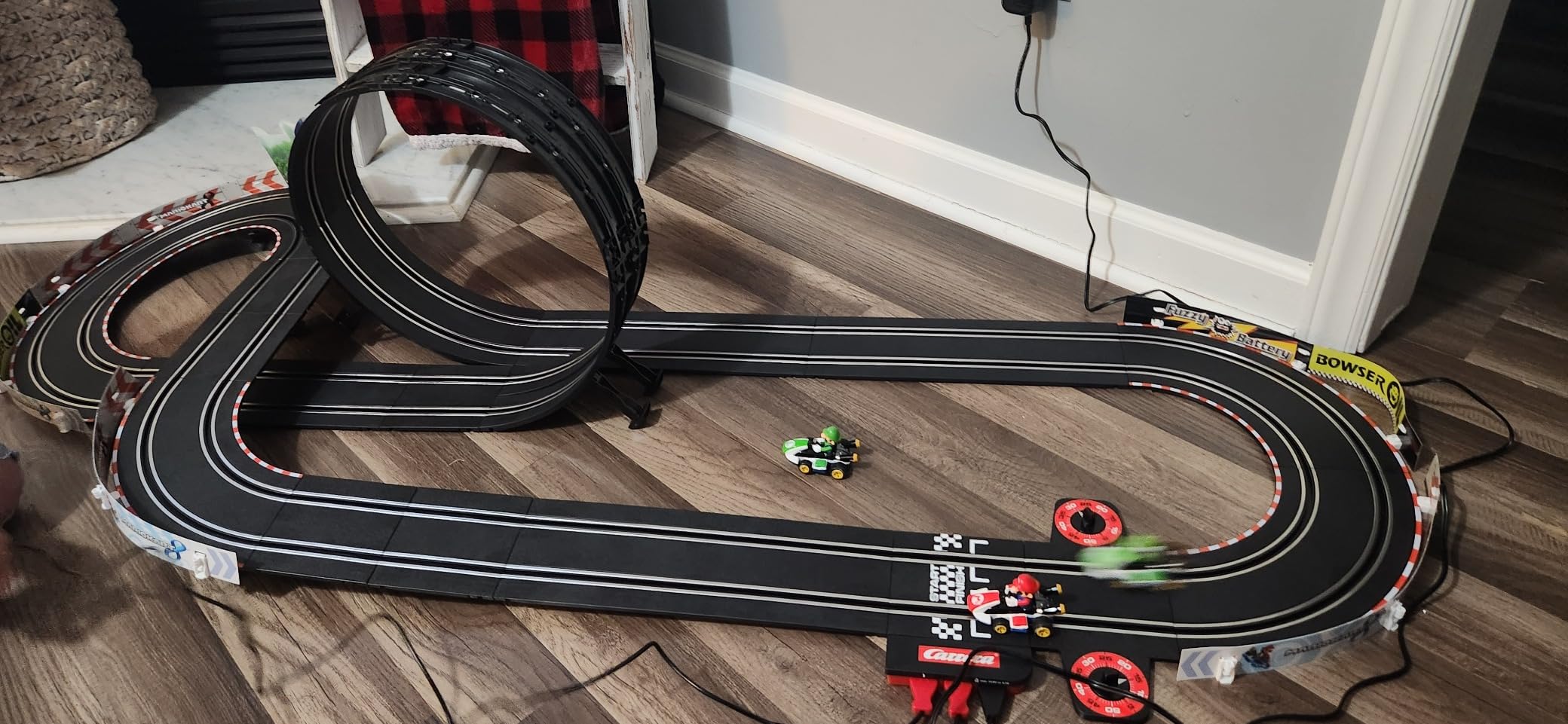 Carrera GO 62491 Mario Kart Electric Powered Slot Car Racing Kids Toy Race Track Set Includes 2 Hand Controllers Featuring Mario Versus Luigi in 1:43 Scale customer photo 1