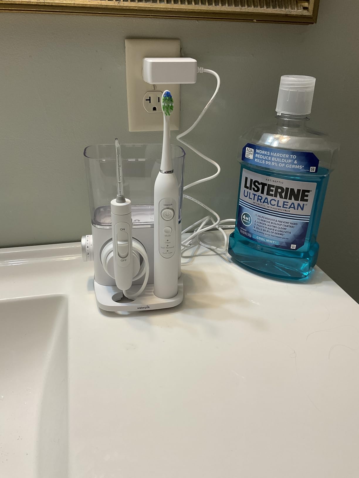 Waterpik Sensonic Complete Care Water Flosser and Rechargeable Electric Toothbrush Combo Set, CC-04, White customer photo 1