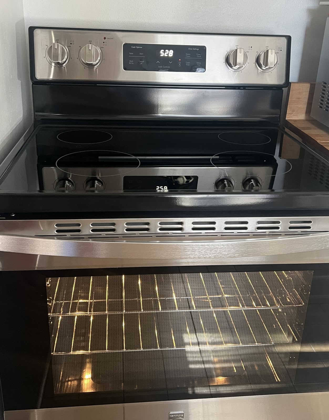 Kenmore 5.2 cu ft. Rear Control Electric Range - 4 Cooktop Elements - Steam Clean Oven & Hidden Bake for Easy Cleaning - Ultra-Durable Chrome Racks & Storage Drawer - Black customer photo 2