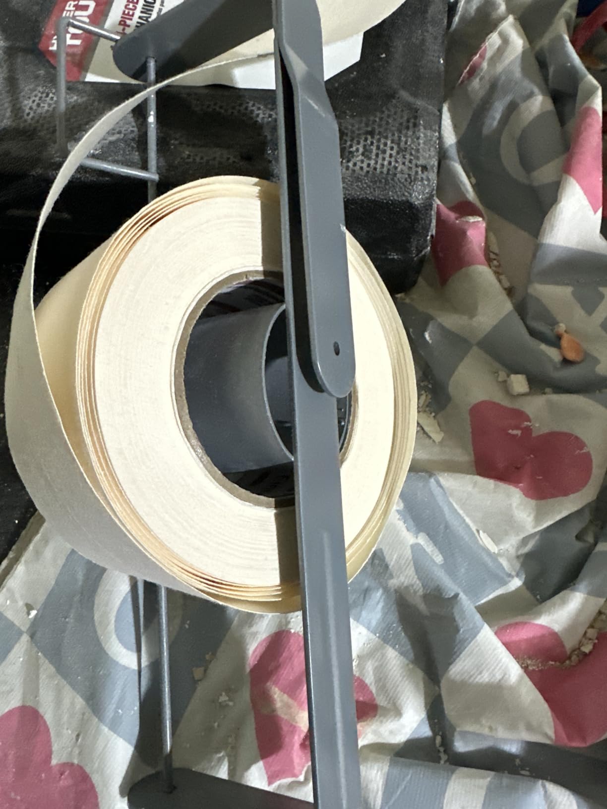 Heavy Duty Drywall Tape Holder, Drywall Tape Reel Dispenser Holder, Quick Loading Retaining Pin & Easy-to-Use Belt Clip, Powder Coated Rust-Proof Steel, Holds up to 500 feet of Tape customer photo 2