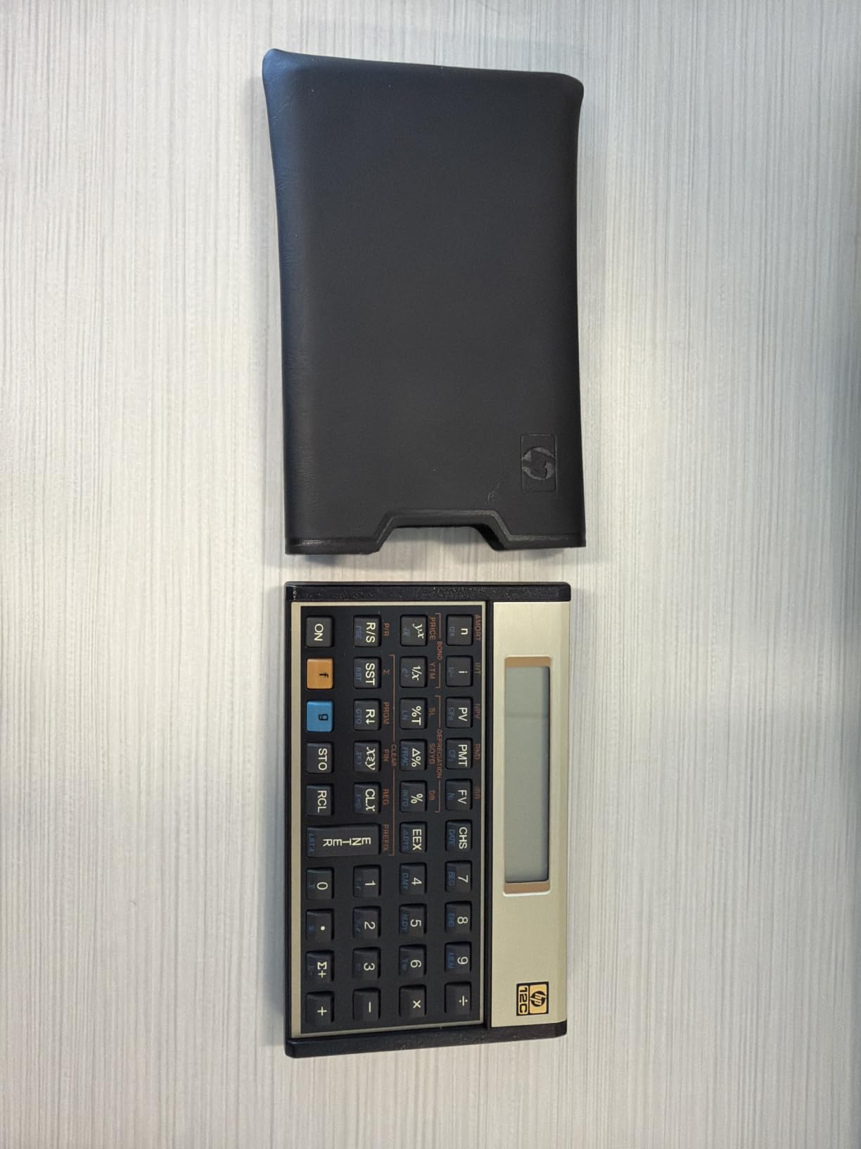 HP 12C Financial Calculator - 120+ Functions: TVM, NPV, IRR, Amortization, Bond Calculations, Programmable Keys - RPN Desktop Calculator customer photo 1